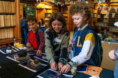 Children getting involved in an activity at Earth Science Week